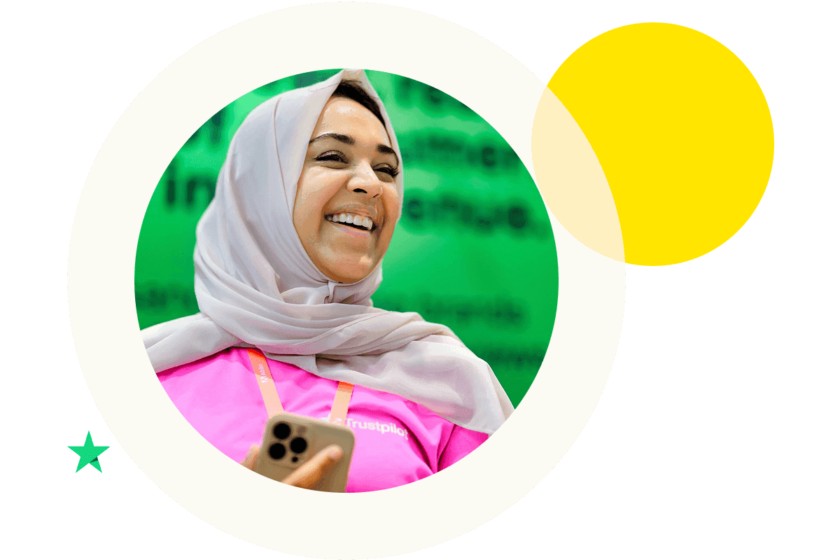 A light beige Circle with a photo of a female looking away and smiling. It also features a small Trustpilot star in the bottom left corner and a yellow circle in the top right.