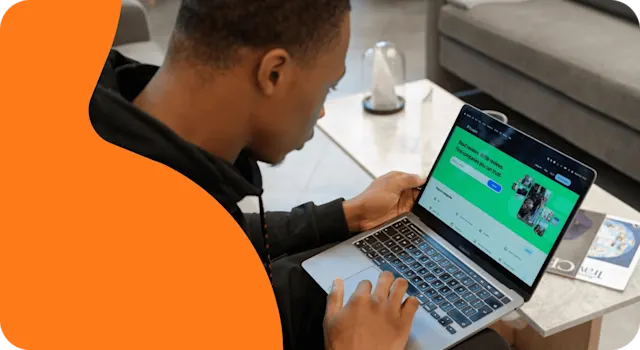 A photo of a man looking at the Trustpilot website